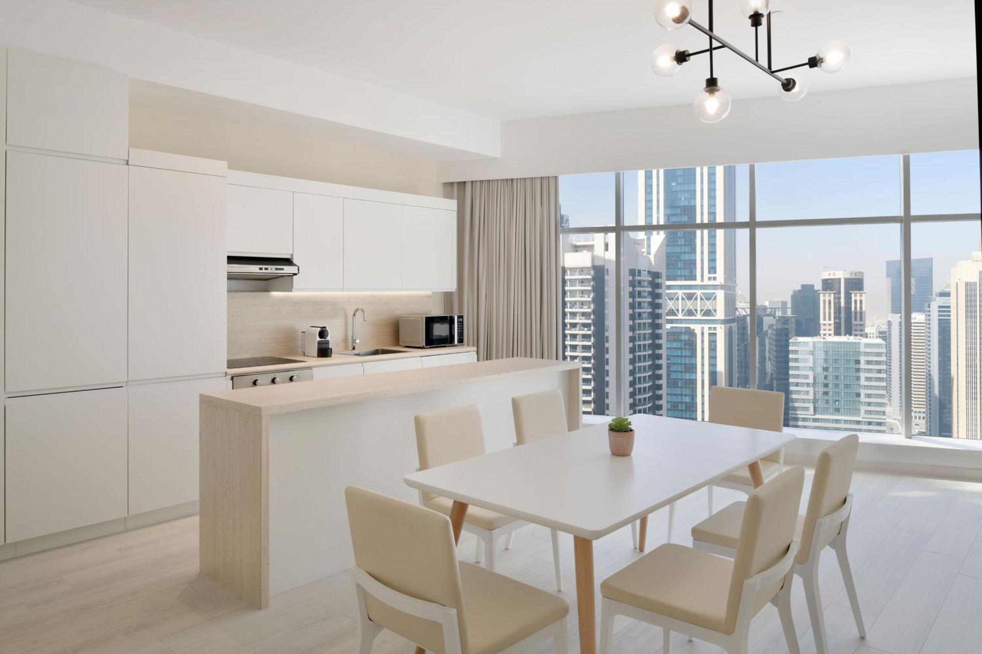 Отель Element By Westin West Bay Доха Экстерьер фото A kitchen in a typical apartment