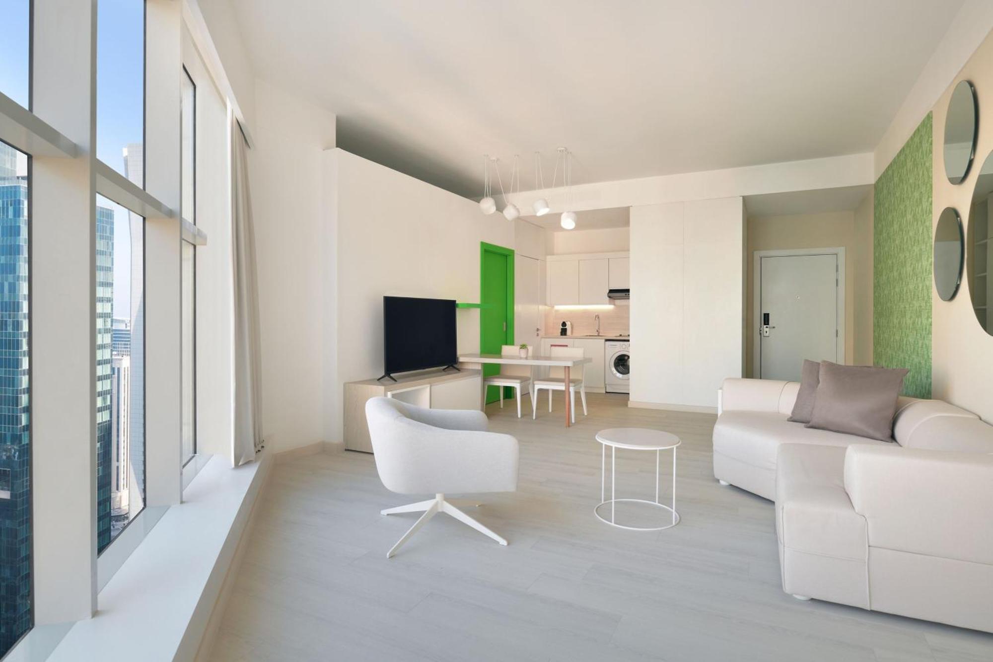 Отель Element By Westin West Bay Доха Экстерьер фото Interior of a typical apartment