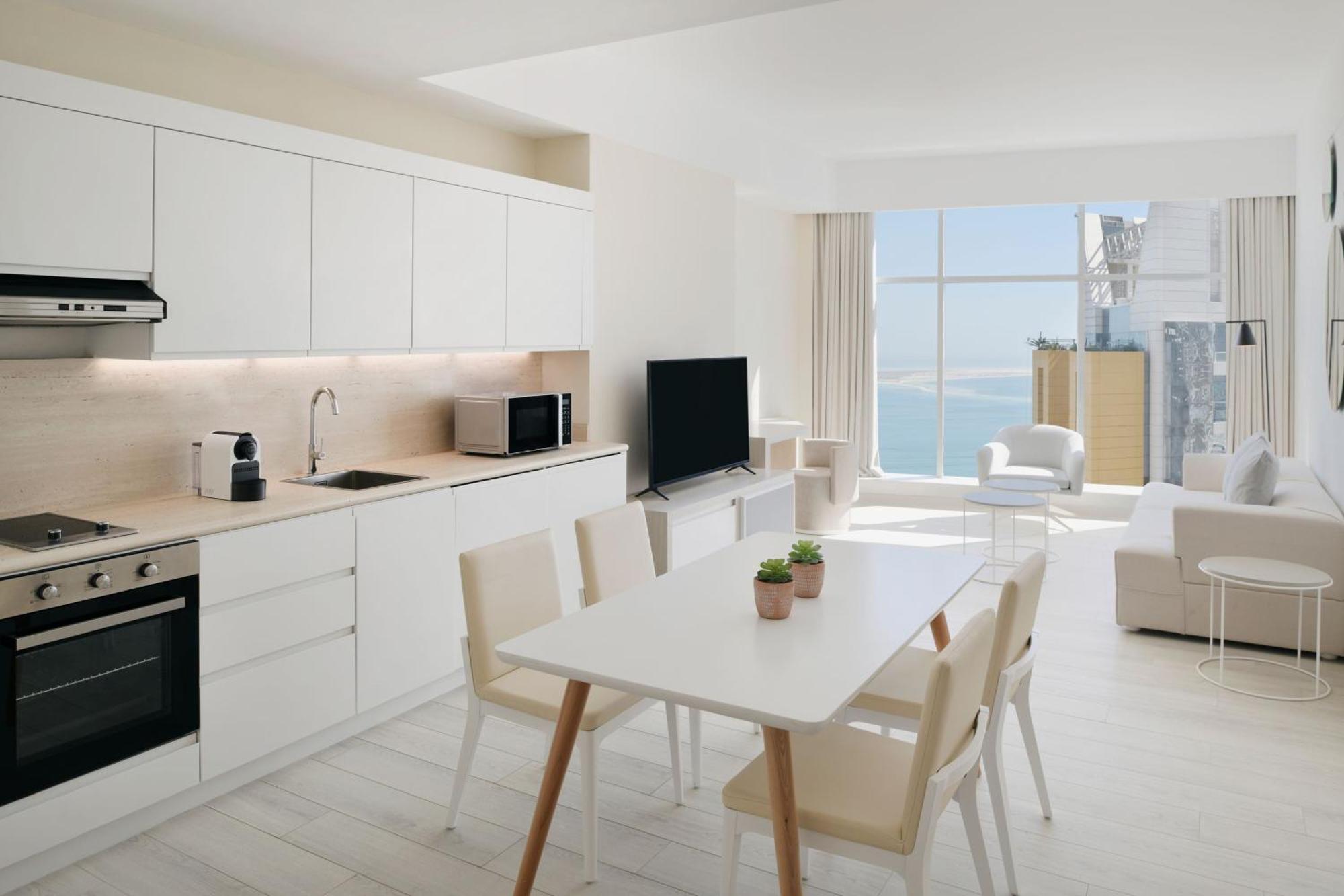 Отель Element By Westin West Bay Доха Экстерьер фото Interior of a typical apartment